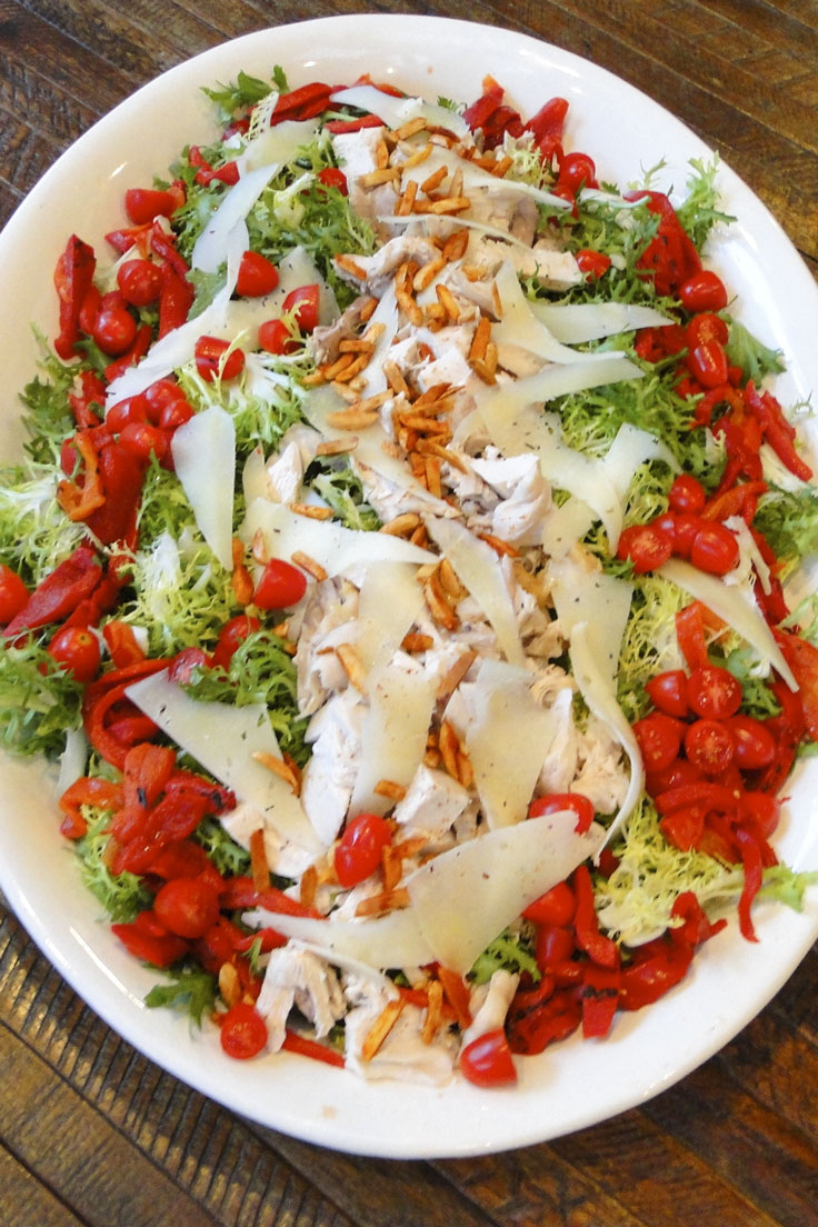 Chicken Frisee Salad With Roasted Peppers Manchego And Spanish Paprika