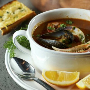 Cioppino, or fisherman's stew, is a great dish for entertaining and surprisingly simple to make. Better yet, it is very flexible, buy whatever seafood is fresh and inexpensive and you can't go wrong.