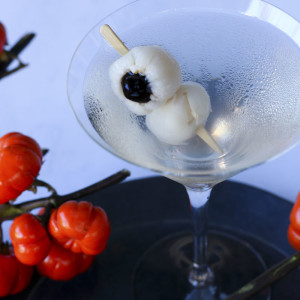Spooky and tasty, this Halloween cocktail is made with delicious ingredients: Vodka, St. Germain, lemon, lychees and Luxardo maraschino cherries.