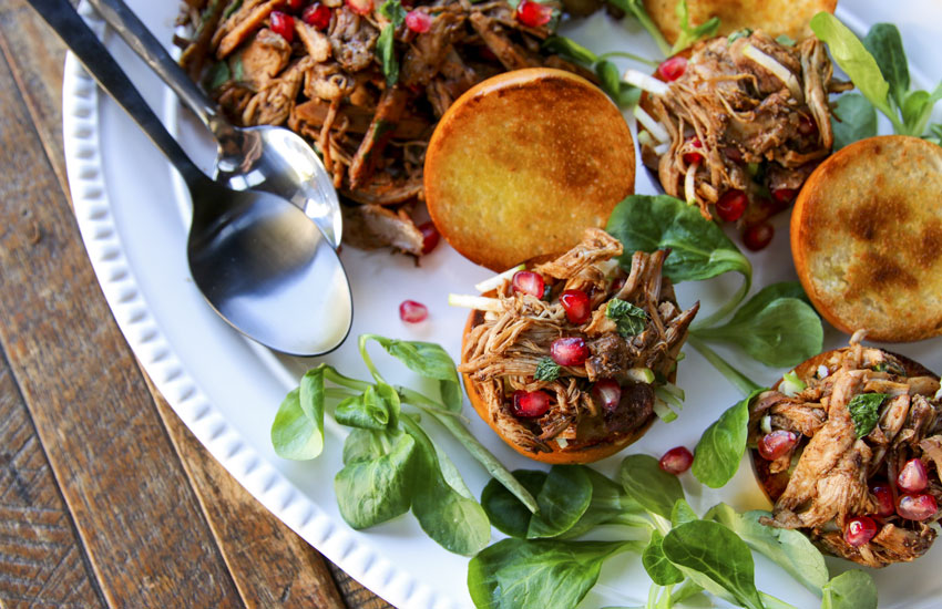 A healthy and easy turkey variation on pulled pork that is bursting with cherry chipotle flavor and crunchy with pomegranate seeds and finely sliced apples.