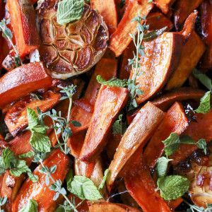 These delicious sweet potatoes are a mashup based on Ottolenghi and Ruth Reichl's recipes. Roasted in an orange juice, marmalade and angostura bitters glaze, they remind me of an Old Fashioned cocktail without the booze.