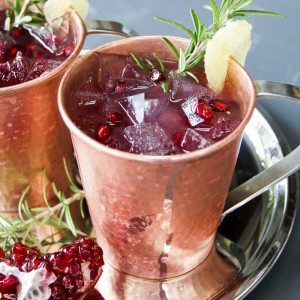 A festive Pomegranate Moscow Mule made with Pama Pomegranate Liqueur is just the thing for celebrating the winter holidays.