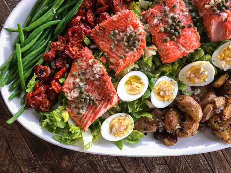 Salmon salad with smashed potatoes and roasted tomatoes | something New For Dinner