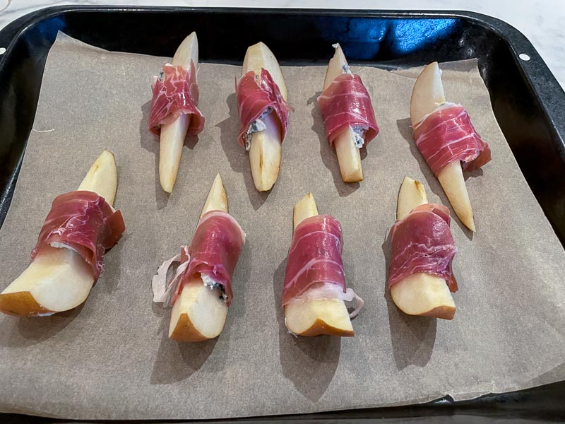 Prosciutto and blue cheese wrapped roasted pears