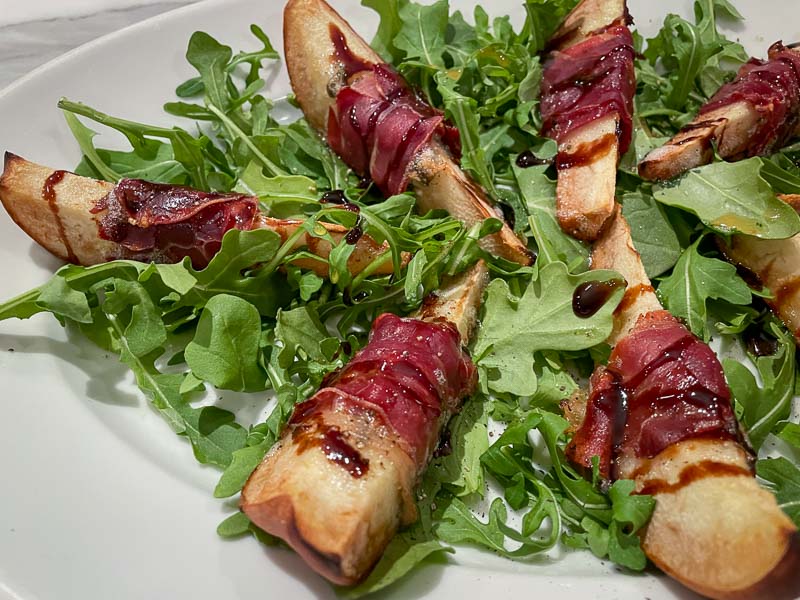 Prosciutto and blue cheese wrapped roasted pears